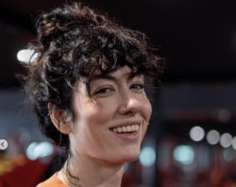 Natasha Aughey in Gym Gear Says "That’s Just Sweat" While Showing Off Her Strength