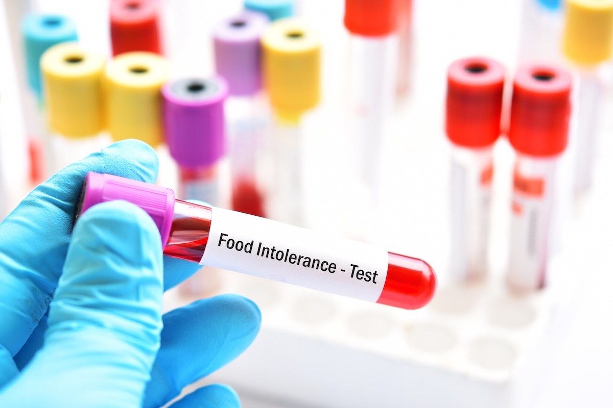 Blood sample in a test tube with the words, food intolerance test.