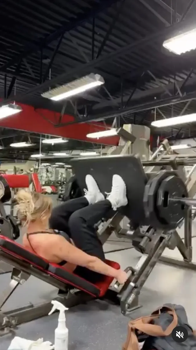 Whitney Simmons does leg presses.