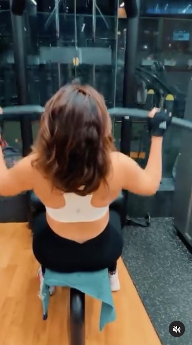 Shama Sikander does lat pull-downs