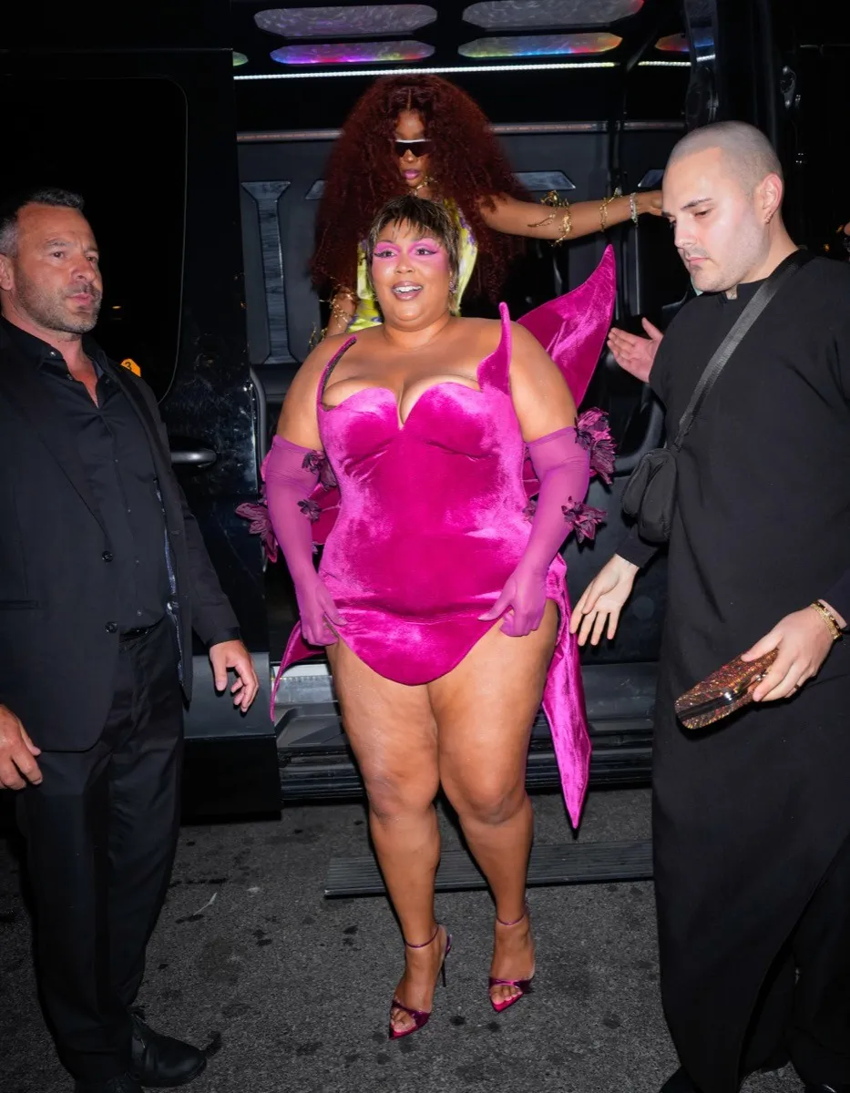 Lizzo gets an escort at the Met Gala